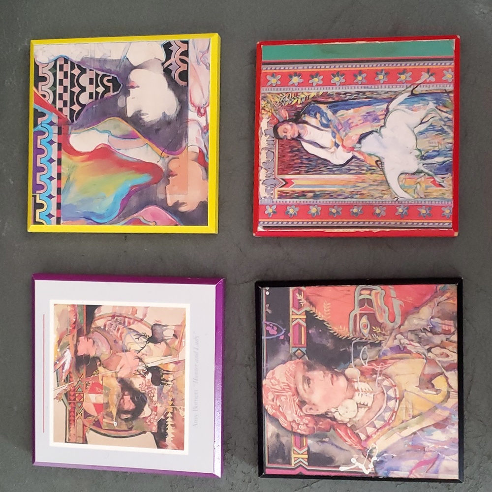 Set Of 4 signed Amy Burnett Coasters.